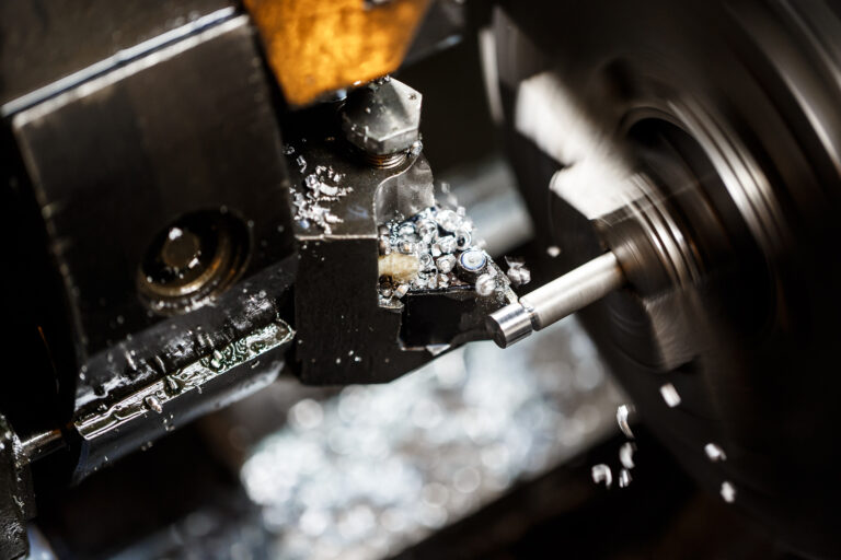 Close up photo of metalworking machine on plant.